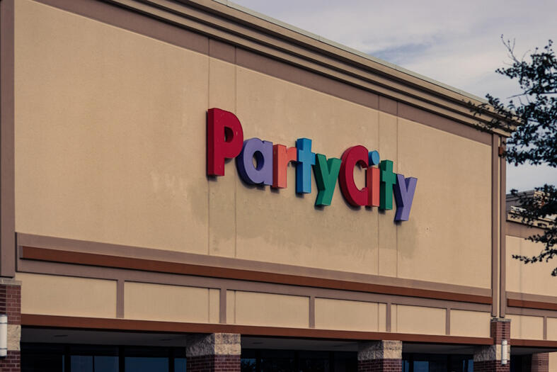 The façade of a recently-closed Party City.